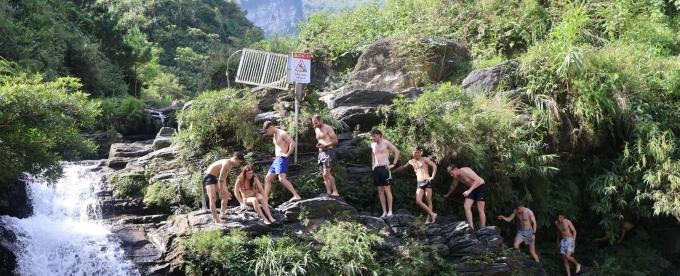 Tourists Queue to Jump at Du Gia Waterfall in Ha Giang
