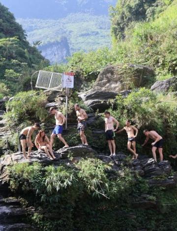 Tourists Queue to Jump at Du Gia Waterfall in Ha Giang